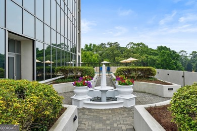 Perched high above Buckhead on the 25th floor, this exceptional