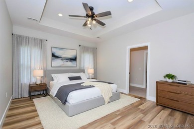 BRAND NEW HOME in the HEART of Osage Beach!! This striking home - photo 26