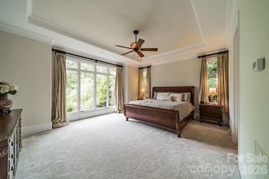 Located in the exclusive gated community of Chatelaine, this - photo 10