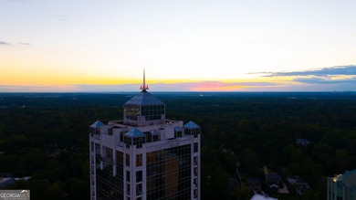 Perched high above Buckhead on the 25th floor, this exceptional