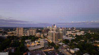 Perched high above Buckhead on the 25th floor, this exceptional