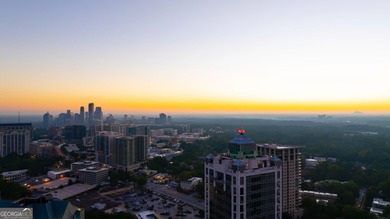 Perched high above Buckhead on the 25th floor, this exceptional