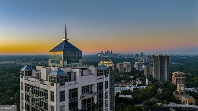 Perched high above Buckhead on the 25th floor, this exceptional