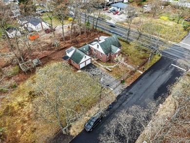 This spacious corner property nestled on a estimated half-acre - photo 16