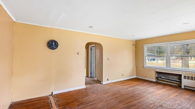 This spacious corner property nestled on a estimated half-acre - photo 17