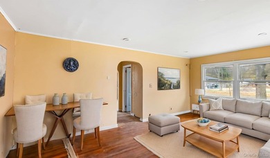 This spacious corner property nestled on a estimated half-acre - photo 18