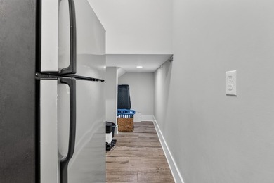 Experience modern coastal living in this 2017-built end-unit - photo 20