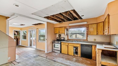This spacious corner property nestled on a estimated half-acre - photo 23
