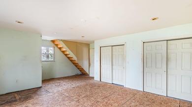 This spacious corner property nestled on a estimated half-acre - photo 28