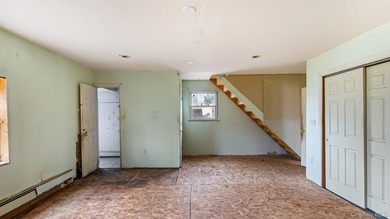 This spacious corner property nestled on a estimated half-acre - photo 29