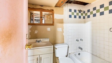 This spacious corner property nestled on a estimated half-acre - photo 34