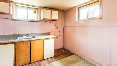 This spacious corner property nestled on a estimated half-acre - photo 38