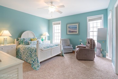 Experience the ultimate in coastal living at this custom-built