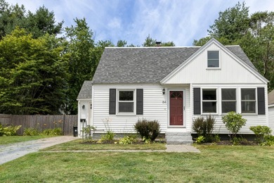 Charming three-bedroom, two-bath Cape located in the desirable - photo 1
