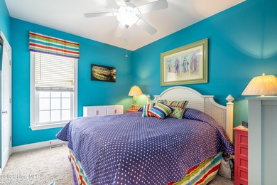 Experience the ultimate in coastal living at this custom-built