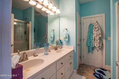 Experience the ultimate in coastal living at this custom-built