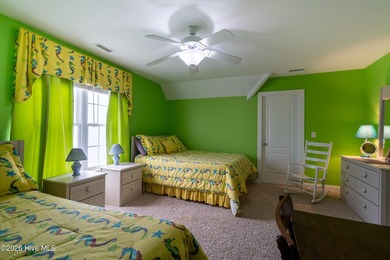 Experience the ultimate in coastal living at this custom-built