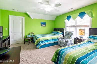 Experience the ultimate in coastal living at this custom-built