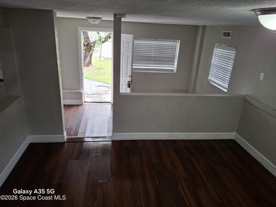 Discover a welcoming SE Palm Bay home that blends comfort - photo 6