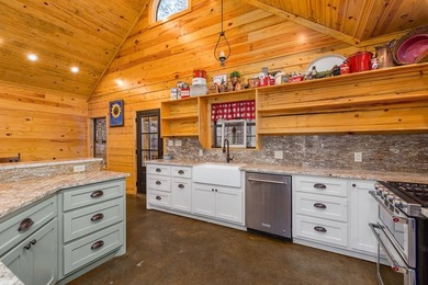 Discover a rare opportunity to own a stunning log home along the - photo 11