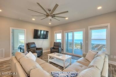 Many recent updates at this beautiful ocean front home. This is