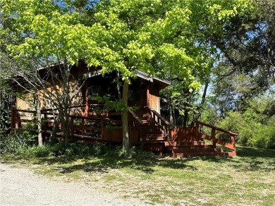 Flippin commercial building in highly visible location w/HWY 62B