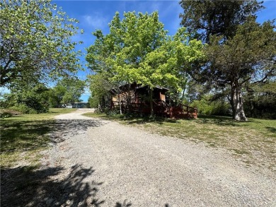 Flippin commercial building in highly visible location w/HWY 62B