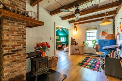 Humming with happiness, this year-round cottage-style home - photo 5