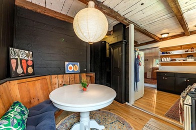 Humming with happiness, this year-round cottage-style home - photo 9