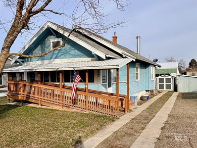 Charming historic home in downtown Fruitland. Located next door