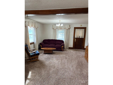 Charming historic home in downtown Fruitland. Located next door