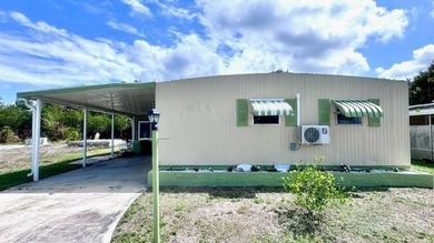 Enjoy waterfront living in this 2-bedroom, 1.5-bath home located - photo 3