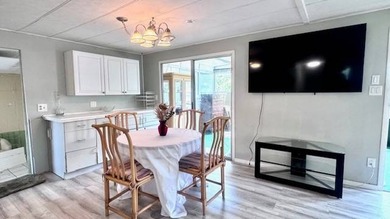 Enjoy waterfront living in this 2-bedroom, 1.5-bath home located - photo 6