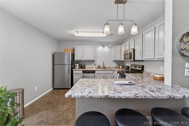 The perfect lake getaway with income potential! This beautifully - photo 11