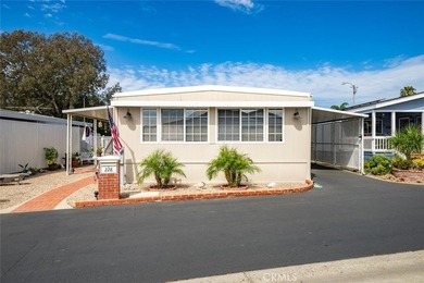 This 55+ community home really delivers, situated in the highly - photo 1