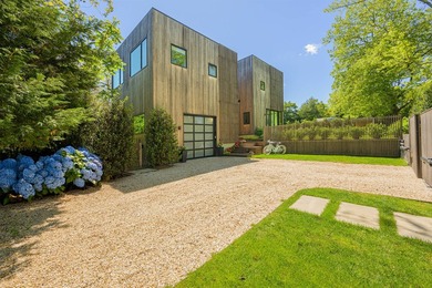 Newly built in 2022, this near-new, net-zero modern sanctuary in - photo 1