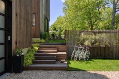 Newly built in 2022, this near-new, net-zero modern sanctuary in - photo 2
