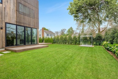 Newly built in 2022, this near-new, net-zero modern sanctuary in - photo 3