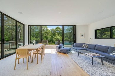 Newly built in 2022, this near-new, net-zero modern sanctuary in - photo 4