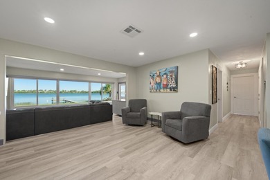 Completely remodeled 4-bed, 3-bath smart lakefront home on a - photo 11