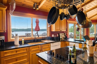 Stunning log home on the main channel of Douglas Lake! This - photo 15