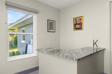 Completely remodeled 4-bed, 3-bath smart lakefront home on a - photo 24