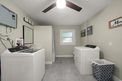 Completely remodeled 4-bed, 3-bath smart lakefront home on a - photo 25