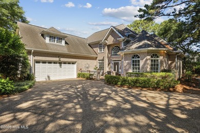 Set within the prestigious community of Landfall, this elegant - photo 4