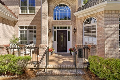 Set within the prestigious community of Landfall, this elegant - photo 5