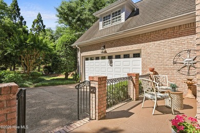Set within the prestigious community of Landfall, this elegant - photo 7