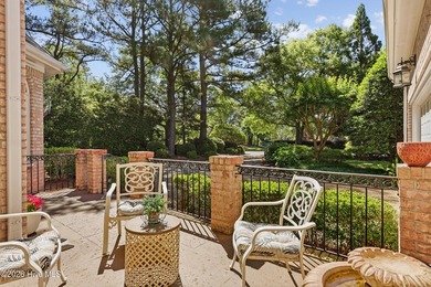 Set within the prestigious community of Landfall, this elegant - photo 8