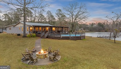 SUNSETS AND VIEWS FOR DAYS! This stunning fee simple lake home - photo 6