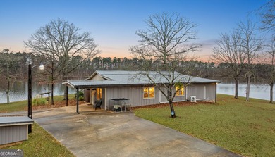 SUNSETS AND VIEWS FOR DAYS! This stunning fee simple lake home - photo 8