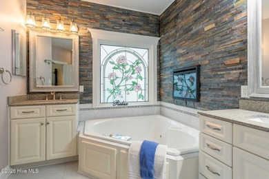 Located in the prestigious, gated waterfront community of - photo 13